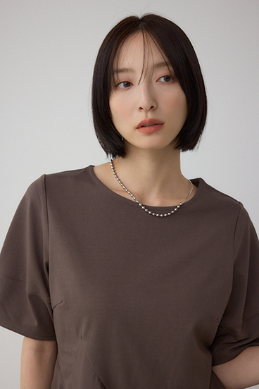 ペプラムカットフレアトップス