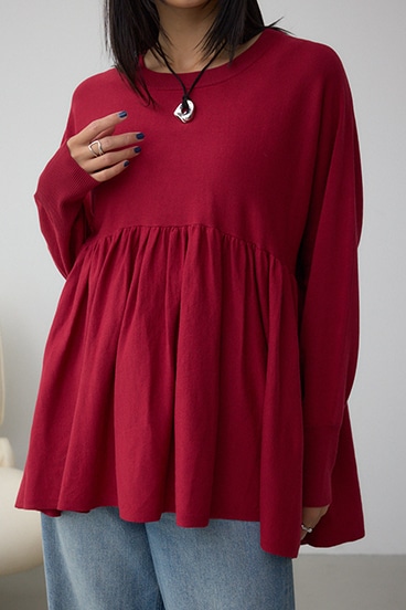 ペプラムデザインニットトップス