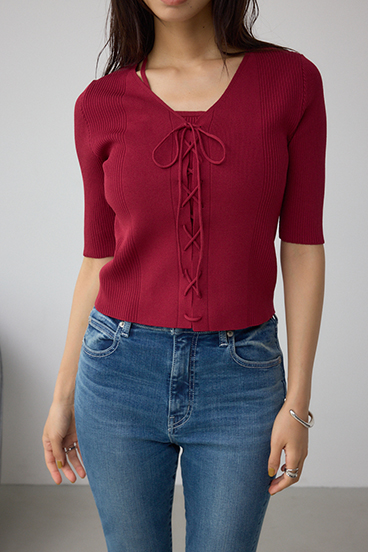 フェイクレイヤードレースアップニット