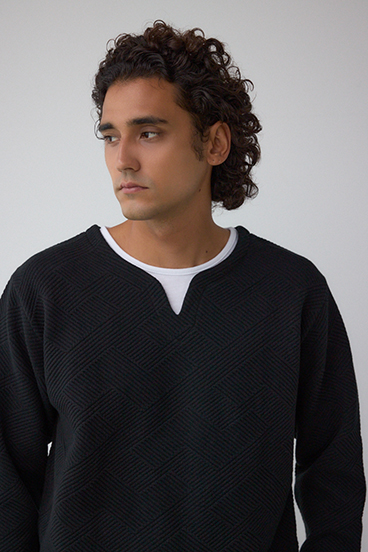 ジオメトリック柄トップス